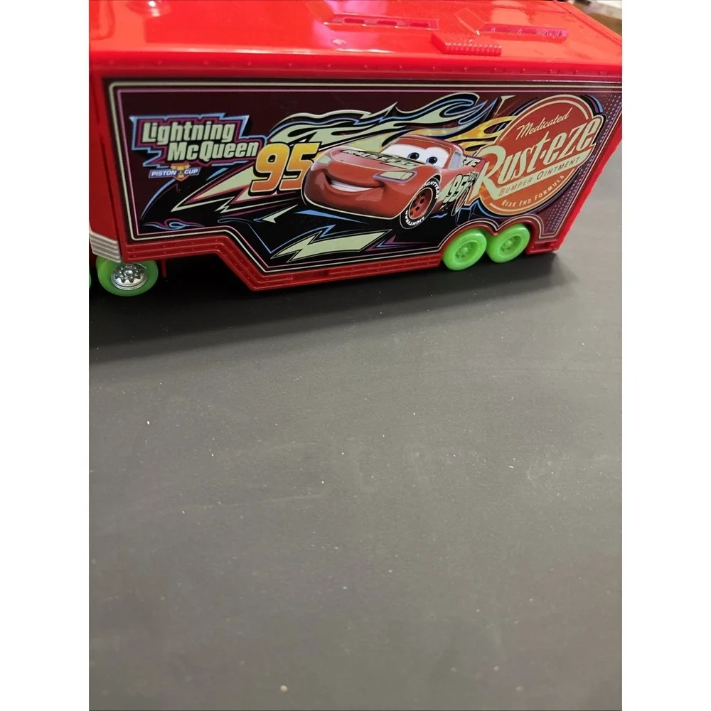 Disney Pixar Cars Lot - Mack Transforming Playset Hauler & Moving Moments Mater